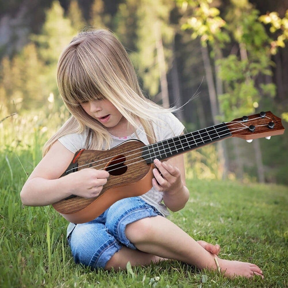 Mini guitare 4 cordes à motif cœur